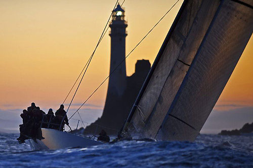 Niklas Zennström's 21.9 metre JV 72 Rán 2 (GBR) at the Fastnet Rock, during the Rolex Fastnet Race 2009.Photo copyright Rolex - Kurt Arrigo.