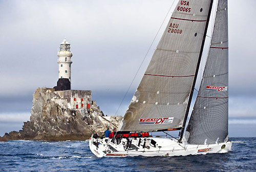 Roger Sturgeon's STP 65 Rosebud Team DYT, passing Fastnet Rock during the Rolex Fastnet Race 2009. Photo copyright Rolex - Kurt Arrigo.