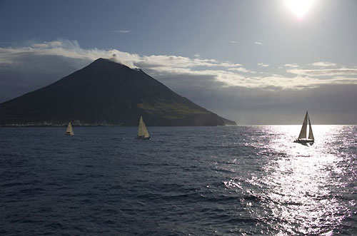 Rolex Middle Sea Race fleet passing Stromboli, Rolex Middle Sea Race 2009. Photo copyright Rolex / Kurt Arrigo.