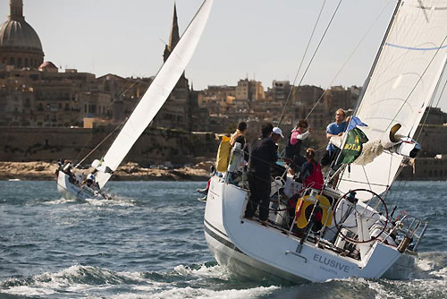 Arthur Podesta's Beneteau First 45, Eluisve 2 Medbank and Edward Broadway's Farr 40, Hooligan VI, entering Marsamxett Harbour, during the Rolex Middle Sea Race 2009. Photo copyright Rolex / Kurt Arrigo.