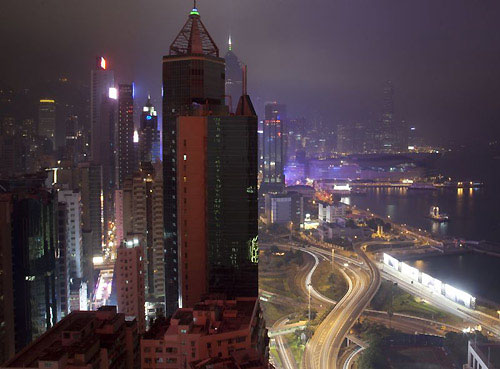 Hong Kong's Causeway Bay by night. Photo copyright Daniel Forster, Rolex.