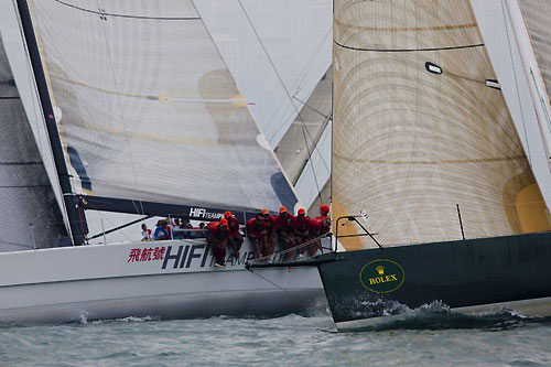 Ray Roberts' TP52 Evolution Racing and Neil Pryde's Welbourne 52 Custom HIFI, after the start of the Rolex China Sea Race 2010. Photo copyright Daniel Forster, Rolex.