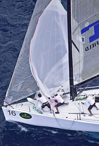 Spinnaker hoisting onboard Guido Belgiorno-Nettis's Transfusion. Photo copyright Daniel Forster, Rolex.