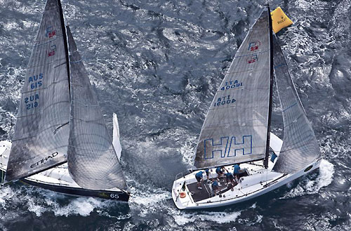Lisa and Martin Hill's Estate Master and Alberto Rossi's Enfant Terrible turning the windward mark, during the Rolex Farr 40 Worlds 2010 in Casa de Campo. Photo copyright Daniel Forster, Rolex.