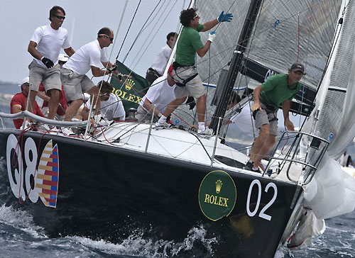 Hoisting spinnaker onboard Massimo Mezzaroma's Nerone, during the Rolex Farr 40 Worlds 2010 in Casa de Campo. Photo copyright Daniel Forster, Rolex.