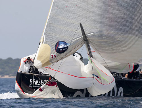 Louis Vuitton Trophy, La Maddalena, Sardegna. Race day six and TeamOrigin had a close battle with Synergy as they beat to the weather mark and a downwind run with TeamOrigin spilling the spinnaker all over the deck. Photo copyright Bob Grieser, Outsideimages NZ and Louis Vuitton Trophy.