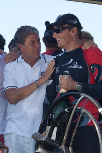 Louis Vuitton Trophy, La Maddalena, Italy, May 22nd-June 6th 2010. Race Day 16. Final: Emirates Team New Zealand (NZL) beats Synergy Russian Sailing Team (RUS). Yves Carcelle, CEO Louis Vuitton, congratulates Dean Barker for the victory. Photo copyright Bob Grieser, Outsideimages NZ and Louis Vuitton Trophy.