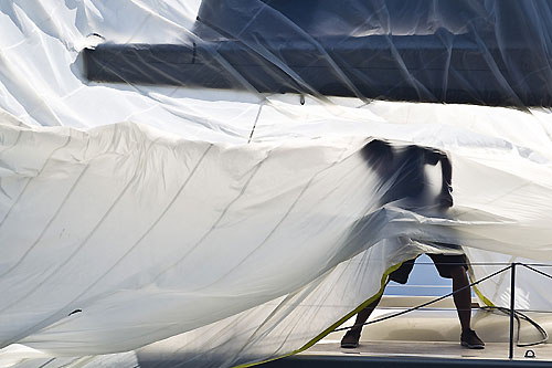 Brian Benjamin's Mini maxi Aegir, dropping their spinnaker. Photo copyright Carlo Rolex and Borlenghi.