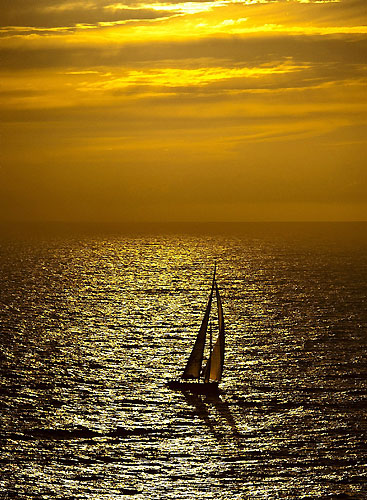 Igor Simcic's Esimit Europa 2, witnesses a breathtaking sunset in the surroundings of the Giraglia Rock. Photo copyright Rolex and Kurt Arrigo.