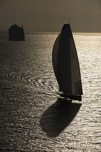 Igor Simcic's Esimit Europa 2 sailing past Stromboliccio, during the 31st Rolex Middle Sea Race. Photo copyright Rolex and Kurt Arrigo.