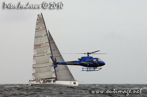 Alan Brierty’s Reichel Pugh 62 Limit, behind a low flying media helicoptor, during the 2010 Rolex Trophy Rating Series offshore Sydney Australia. Photo copyright Peter Andrews, Outimage Australia.