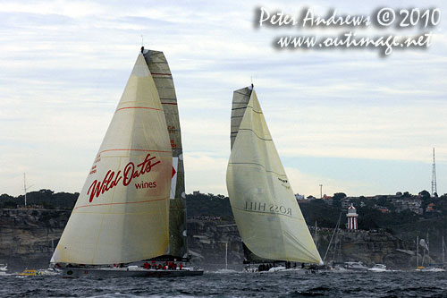 Wild Oats XI and Investec Loyal offshore with South Head in the background making way to the seaward mark for the final turn towards Hobart, after the start of the Rolex Sydney Hobart 2010. Photo copyright Peter Andrews, Outimage Australia.