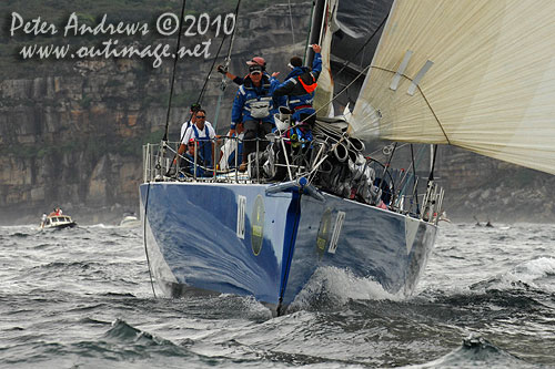 Grant Wharington's Maxi Wild Thing outside the heads after the start of the Rolex Sydney Hobart 2010. Photo copyright Peter Andrews, Outimage Australia.