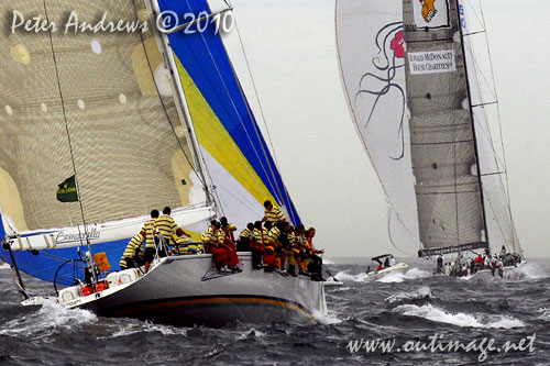 Jim Cooney's Jutson 79 Brindabella chasing Peter Millard and John Honan's Maxi Lahana, outside the heads after the start of the Rolex Sydney Hobart 2010. Photo copyright Peter Andrews, Outimage Australia.