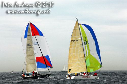 William N Hubbard's Baltic 46 Dawn Star from the United States (left) and Ian Miller's Young 11 Young Ones from Victoria, outside the heads after the start of the Rolex Sydney Hobart 2010. Photo copyright Peter Andrews, Outimage Australia.