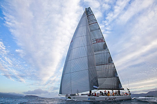 Alan Brierty's Reichel-Pugh 62 Limit with the Iron Pot Lighthouse in the background right, marking the entrance of the Derwent River. Photo copyright Rolex and Daniel Forster.