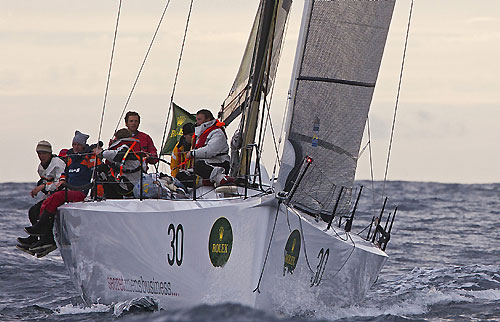 Geoff Boettcher’s South Australian yacht Secret Mens’ Business 3.5 crossing Storm Bay during the Rolex Sydney Hobart Yacht Race. Photo copyright Rolex and Daniel Forster.