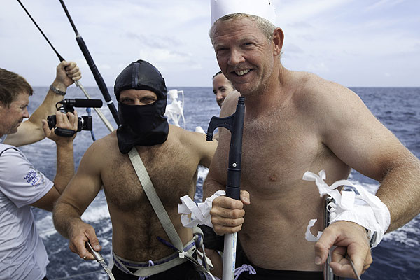 King Neptune (Tony Mutter) and Codfish (Ryan Godfrey) make a guest appearance on PUMA's Mar Mostro at the Equator to greet crew members Rome Kirby and Amory Ross at their first crossing. PUMA Ocean Racing powered by BERG during leg 1 of the Volvo Ocean Race 2011-12, from Alicante, Spain to Cape Town, South Africa.