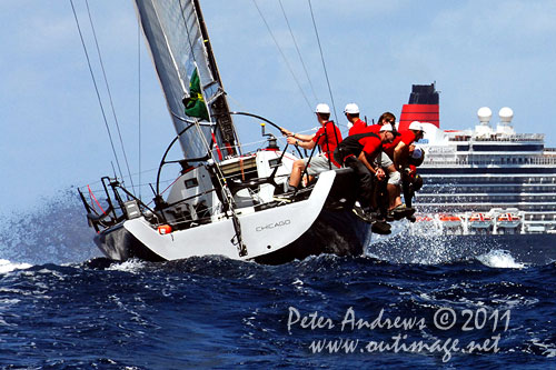 Hemut Jahn's Flash Gordon with the new Cunard liner, the Queen Elizabeth in the background, during day one of the Rolex Farr 40 World Championships 2011, Sydney Australia. Photo copyright Peter Andrews, Outimage Australia.