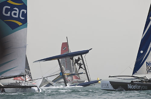 Team Red Bull Extreme Sailing capsizing on day 2 of racing, during the Extreme Sailing Series 2011, Qingdao, China. Photo copyright Lloyd Images.