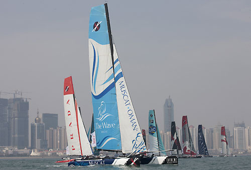 The fleet racing in Fushan Bay, Qingdao, during the Extreme Sailing Series 2011, Qingdao, China. Photo copyright Lloyd Images.