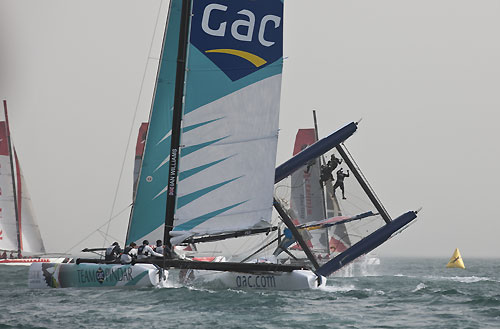 Red Bull Extreme Sailing capsize in race 4 on day 3, during the Extreme Sailing Series 2011, Qingdao, China. Photo copyright Lloyd Images.