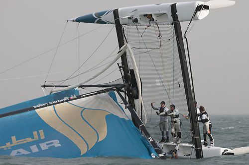 Oman Air, the 4th and final capsize of day 3, during the Extreme Sailing Series 2011, Qingdao, China. Photo copyright Lloyd Images.