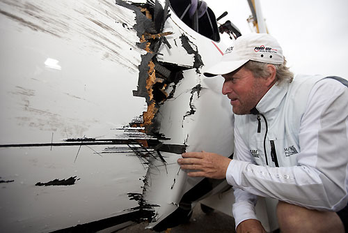 Roland Gaebler, Team Extreme skipper, accessing Alinghi's damage to Team Extreme on day 3 of Act 3, Instanbul, during the Extreme Sailing Series 2011, Istanbul, Turkey. Photo copyright Lloyd Images.