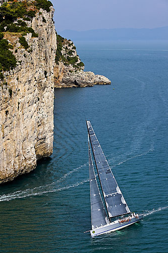 Alegre (GBR), sails pass Sperlonga, during the Rolex Volcano Race, Capri, Italy. Photo copyright Rolex and Carlo Borlenghi.