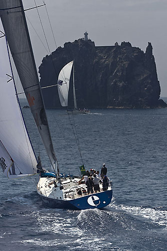 Ernesto Gismondi's Wally 65 Edimetra VI (ITA) approaches Strombolicchio, during the Rolex Capri Sailing Week and Rolex Volcano Race, Capri, Italy. Photo copyright Rolex and Carlo Borlenghi.