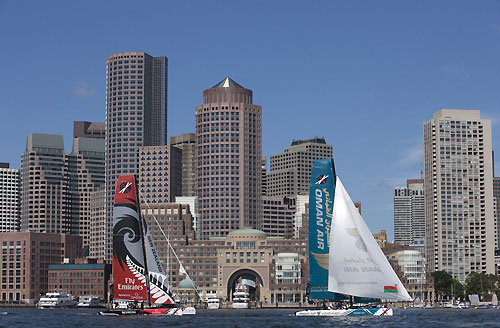 Oman Air and Emirates Team New Zealand, during the Extreme Sailing Series 2011, Boston, USA. Photo Copyright Lloyd Images.