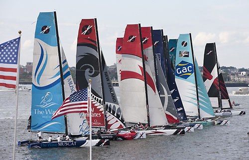 The fleet on the start line right in front of the race village, during the Extreme Sailing Series 2011, Boston, USA. Photo Copyright Lloyd Images.