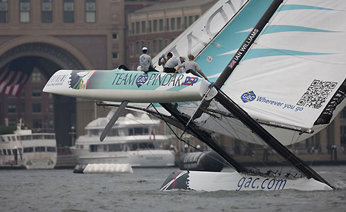 Skipper Ian Williams flying a hull on Team GAC Pindar for the crowds over the finish line, during day 4 of the Extreme Sailing Series 2011, Boston, USA. Photo Copyright Lloyd Images.