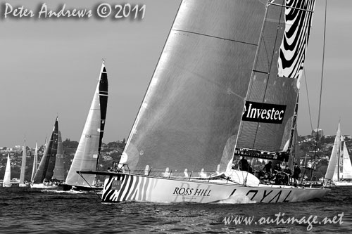 Anthony Bell's 100 ft maxi Investec Loyal on Sydney Harbour, after the start of the Audi Sydney Gold Coast 2011. Photo copyright Peter Andrews, Outimage Australia.