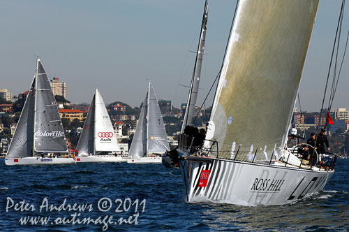 Anthony Bell's 100 ft maxi Investec Loyal on Sydney Harbour, after the start of the Audi Sydney Gold Coast 2011. Photo copyright Peter Andrews, Outimage Australia.