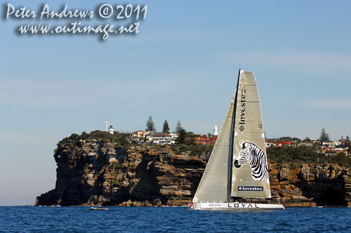 Anthony Bell's 100 ft maxi Investec Loyal on Sydney Harbour, after the start of the Audi Sydney Gold Coast 2011. Photo copyright Peter Andrews, Outimage Australia.