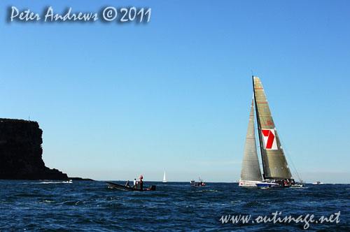 Bob Oatley's Reichel Pugh 100 Wild Oats XI, on Sydney Harbour after the start of the Audi Sydney Gold Coast 2011. Photo copyright Peter Andrews, Outimage Australia.