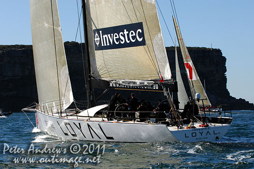 Anthony Bell's 100 ft maxi Investec Loyal and Bob Oatley's Reichel Pugh 100 Wild Oats XI tacking duel out of Sydney Harbour, after the start of the Audi Sydney Gold Coast 2011. Photo copyright Peter Andrews, Outimage Australia.