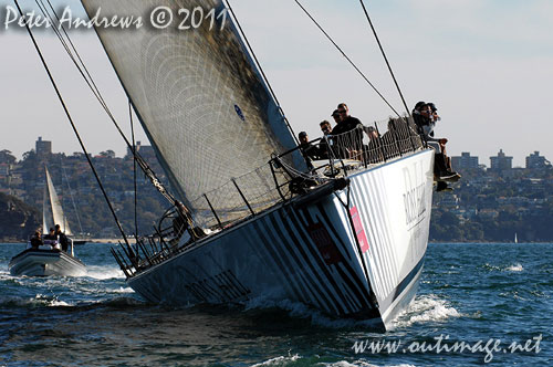 Anthony Bell's 100 ft maxi Investec Loyal on Sydney Harbour, after the start of the Audi Sydney Gold Coast 2011. Photo copyright Peter Andrews, Outimage Australia.