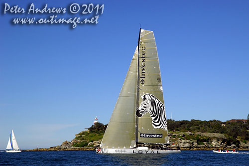 Anthony Bell's 100 ft maxi Investec Loyal on Sydney Harbour, after the start of the Audi Sydney Gold Coast 2011. Photo copyright Peter Andrews, Outimage Australia.