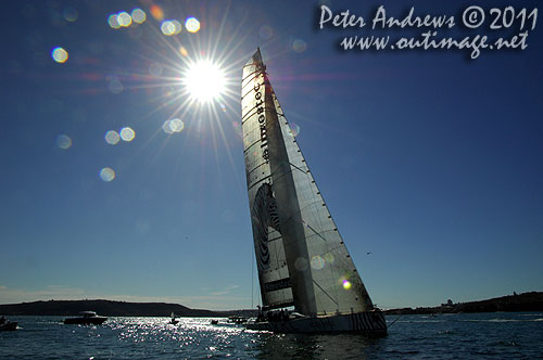 Anthony Bell's 100 ft maxi Investec Loyal on Sydney Harbour, after the start of the Audi Sydney Gold Coast 2011. Photo copyright Peter Andrews, Outimage Australia.