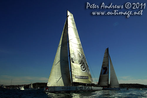 Anthony Bell's 100 ft maxi Investec Loyal and Bob Oatley's Reichel Pugh 100 Wild Oats XI tacking duel out of Sydney Harbour, after the start of the Audi Sydney Gold Coast 2011. Photo copyright Peter Andrews, Outimage Australia.