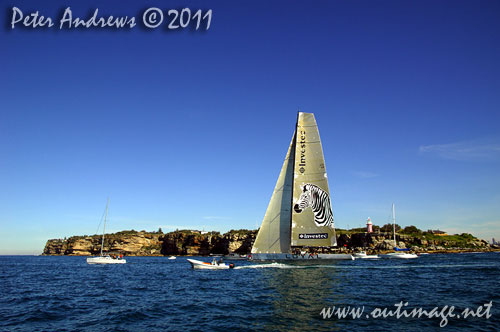 Anthony Bell's 100 ft maxi Investec Loyal on Sydney Harbour, after the start of the Audi Sydney Gold Coast 2011. Photo copyright Peter Andrews, Outimage Australia.