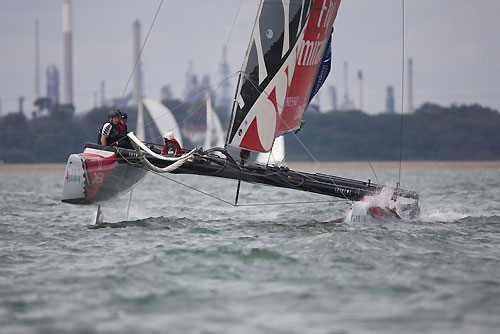 Emirates Team New Zealand racing back on Day 1 of the Extreme Sailing Series 2011, Cowes, United Kingdom. Photo copyright Lloyd Images.