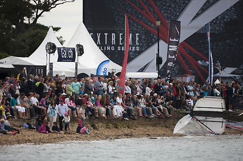 Spectators watching the action from shore back on Day 1 of the Extreme Sailing Series 2011, Cowes, United Kingdom. Photo copyright Lloyd Images.