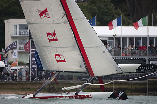 Luna Rossa flying close to the shore on the Day 1 of Act 5 of the Extreme Sailing Series 2011, Cowes, United Kingdom. Photo copyright Lloyd Images.