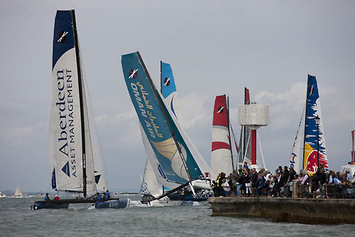 Close to shore action on Day 1, Act 5 of the Extreme Sailing Series 2011, Cowes, United Kingdom. Photo copyright Lloyd Images