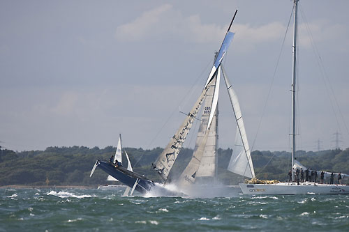 Aberdeen Asset Management racing back on Day 1 of the Extreme Sailing Series 2011, Cowes, United Kingdom. Photo copyright Lloyd Images.