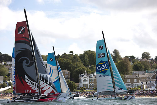 The Extreme 40 fleet racing in front of spectators on shore during Day 2 of Act 5 of the Extreme Sailing Series 2011, Cowes, United Kingdom. Photo copyright Lloyd Images.