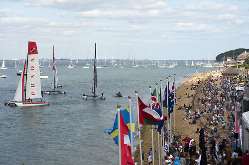 The Extreme 40 fleet racing close to the shore on Day 4 at the Extreme Sailing Series 2011, Cowes, United Kingdom. Photo copyright Lloyd Images.